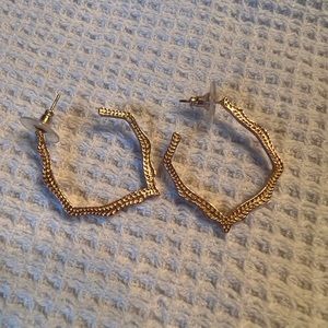 Kendra Scott rose gold Miku hoop earrings.